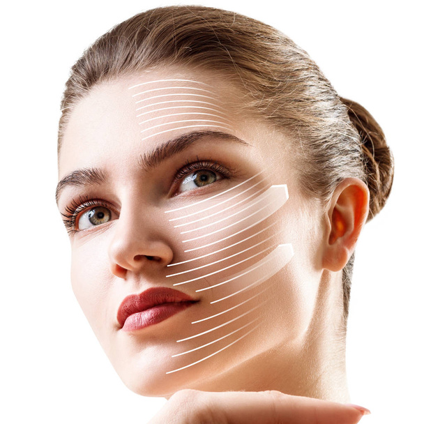 Graphic lines shows facial lifting effect on skin. - Фото, зображення