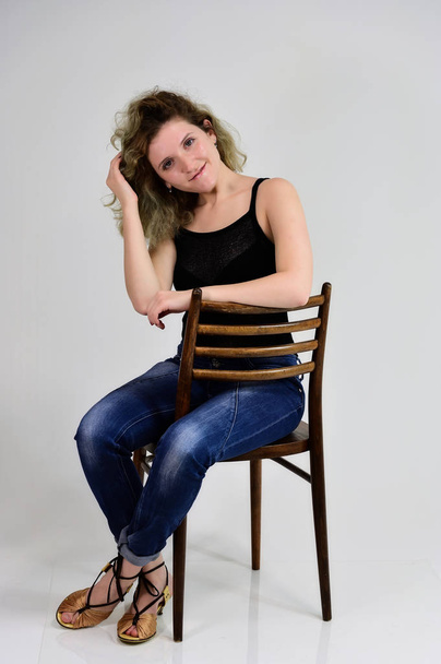Portrait on a chair girl - Photo, Image