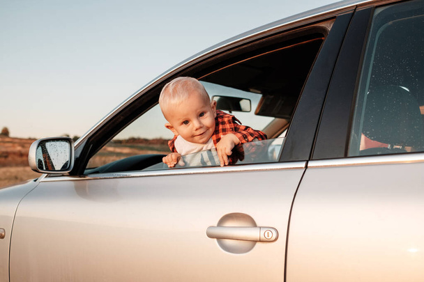 Portrait of One Little Boy Playing with Car - Photo, Image
