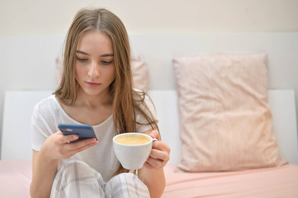 Girl With Cup Of Coffee In Bedroom - Photo, image