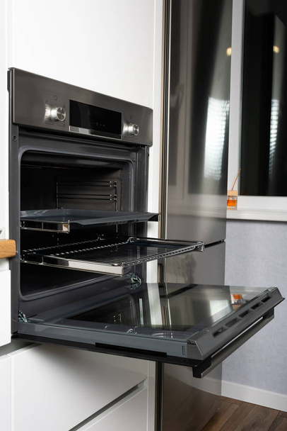 open electric oven in modern kitchen interior - Photo, Image