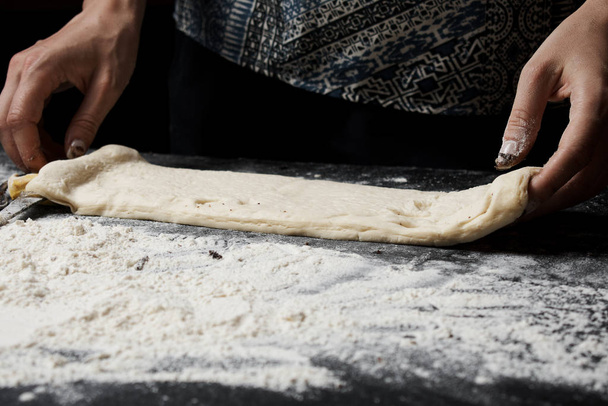 cropped shot of woman preparing fresh homemade dough - Fotó, kép