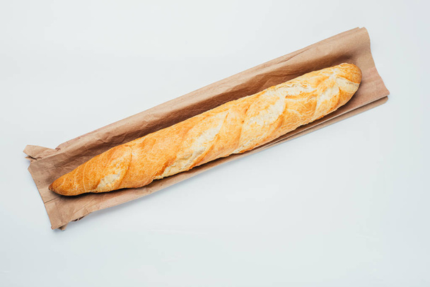 close-up view of delicious fresh bread on white background - Foto, Imagem