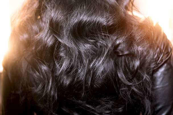 Black long wavy hair - Foto, Imagen