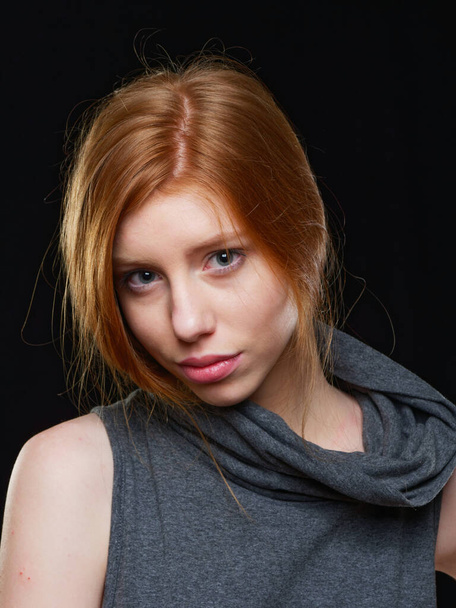 young girl with long red hair on a black background - Foto, Imagem