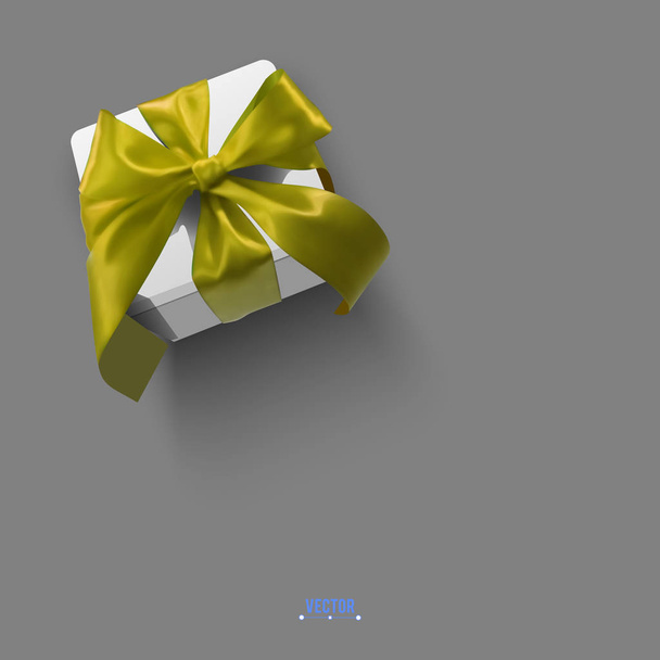 Caja de regalo con arco de oro - Vector, imagen