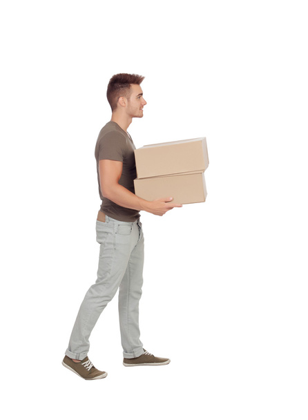Casual young man carrying boxes - Zdjęcie, obraz