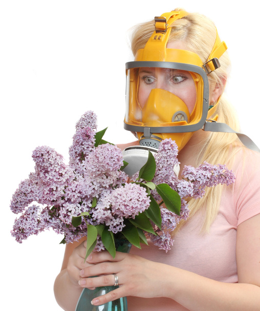 Жінка з квітами в захисній масці
 - Фото, зображення