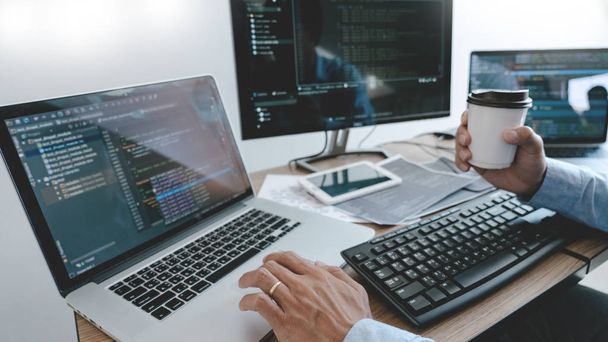 Programmer Typing Code on desktop computer, Developing programmi - Photo, Image
