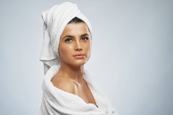 Woman in bathrobe and towel posing. - Zdjęcie, obraz