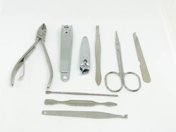 Sada na manikúru nehtů a nůžky na bílém pozadí - Fotografie, Obrázek