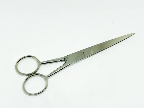 Nail manicure set and scissors against white background - Photo, Image