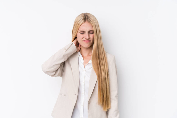 Young business blonde woman on white background suffering neck pain due to sedentary lifestyle. - Foto, afbeelding