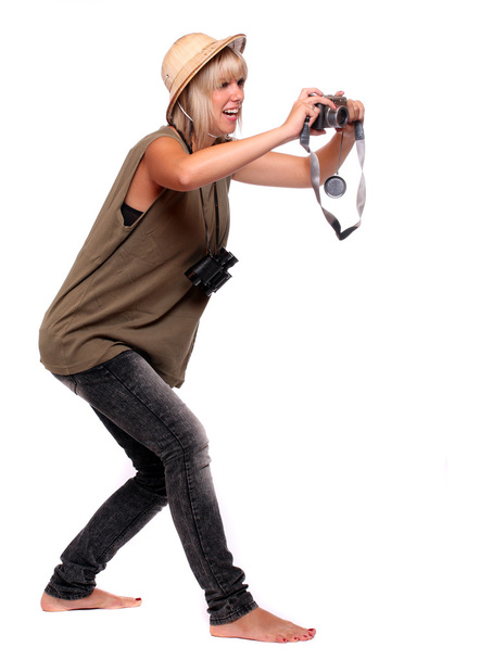 デジタル カメラのサファリのスーツに身を包んだ若い女性. - 写真・画像