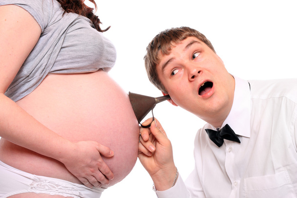 őrült orvos vizsgálata terhes nő. - Fotó, kép