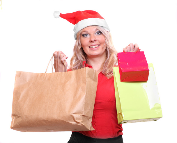 Shopping pretty woman in Santa Claus costume - Фото, изображение