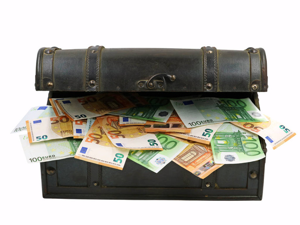 euro banknotes in old open wooden chest isolated on white background - Foto, Imagem