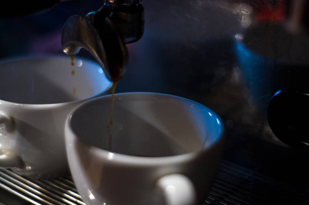 Cappuccino preparation process in coffee shop. Profession barista. The invigorating coffee drink. - Photo, Image