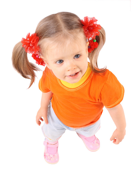 Bambina in t-shirt arancione.Sfondo bianco
. - Foto, immagini
