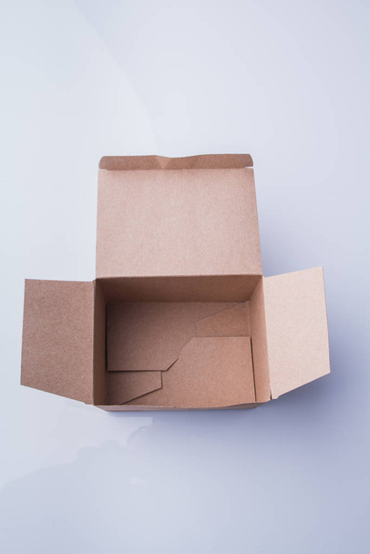 Opened empty cardboard box. - Фото, изображение