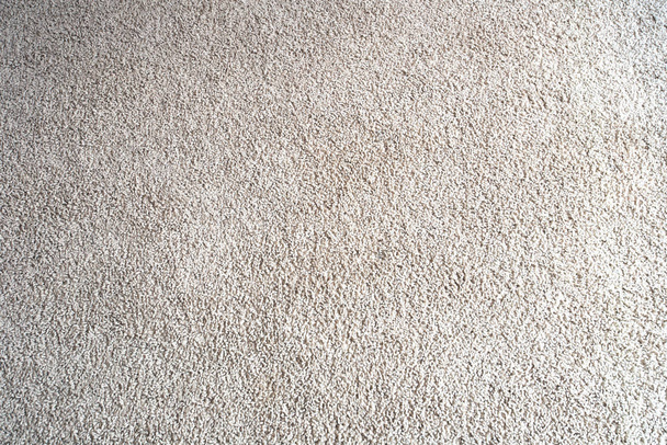 Fényes bézs gyapjú szövet szőnyeg vagy szőnyeg háttér textúra közelkép - Fotó, kép