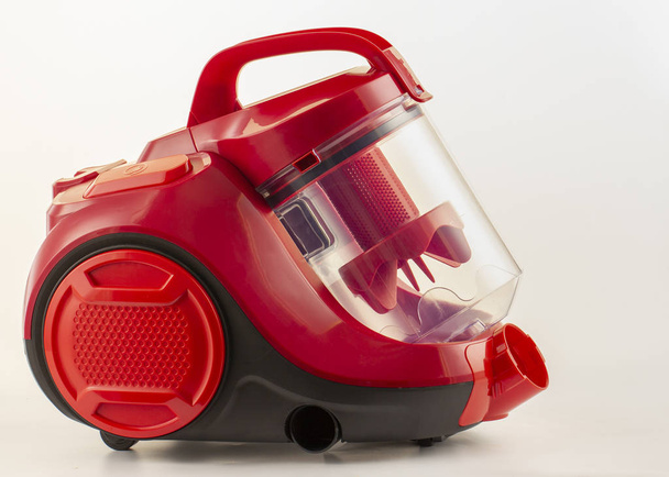 Red vacuum cleaner on a white background - Photo, Image
