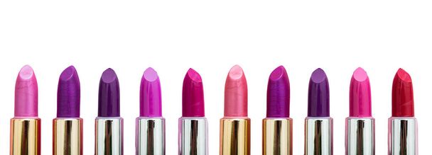 Lipsticks various colors against white background, closeup view - Foto, immagini