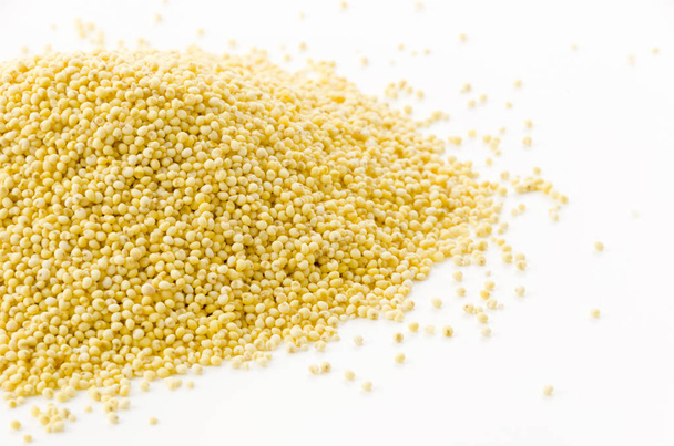 pile of Glutinous Millet on white background - Foto, immagini