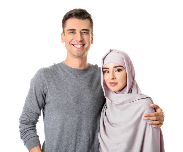 Portrait of Muslim couple on white background - Foto, Imagen