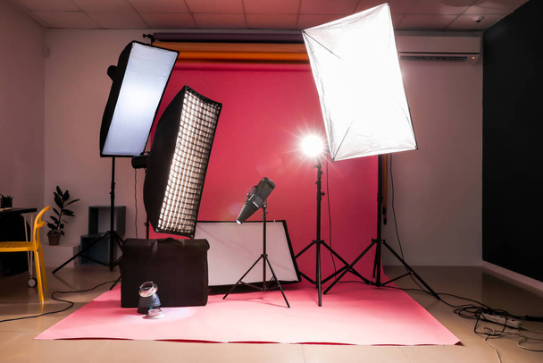 Professional equipment in modern photo studio - Фото, изображение