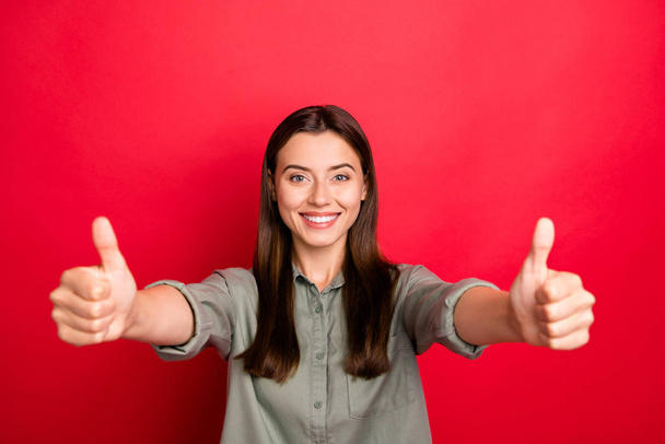 Portrait of her she nice attractive lovely cheerful cheery straight-haired girl great news giving double thumbup ad isolated over bright vivid shine vibrant red color background - Fotoğraf, Görsel