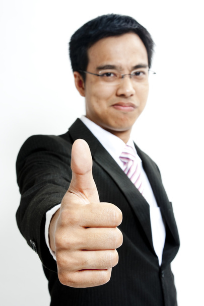 Handsome guy showing goodluck sign - Photo, Image