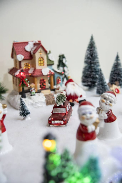 A lot of Christmas decoration ornaments and toys on a white surface - Christmas concept - Fotó, kép