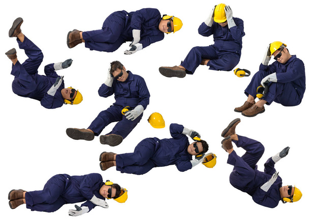 συλλογή σύνολο των εργαζομένων σε μηχανική φόρμα jumpsuit κάθεται απομονωμένο - Φωτογραφία, εικόνα