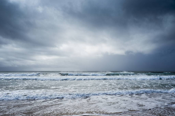 Stormy sea with crazy waves under the dark clouds - Foto, Bild