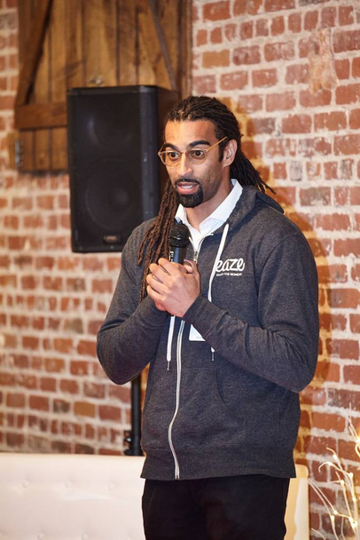 LOS ANGELES, UNITED STATES - Feb 09, 2019: Rashad Johnson of Eaze, a cannabis delivery service, speaking at Weedweek REcharge LA, a cannabis industry conference. - 写真・画像