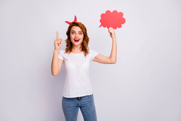 Portrait of excited astonished girl hold red papercard sppech bubble think thoughts decide decisions choose choice solution wear stylish outfit isolated over white color background - Photo, Image