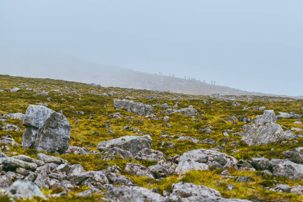 Hiking on the ridge of Romsdalseggen in Norway - Fotoğraf, Görsel