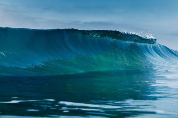 Barrel wave for surfing in ocean. Breaking transparent wave - Photo, Image