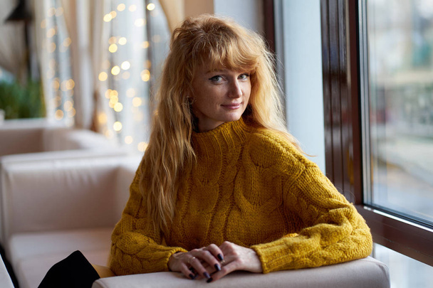 Portrait of a young positive redhead woman wearing stylish yello - Valokuva, kuva