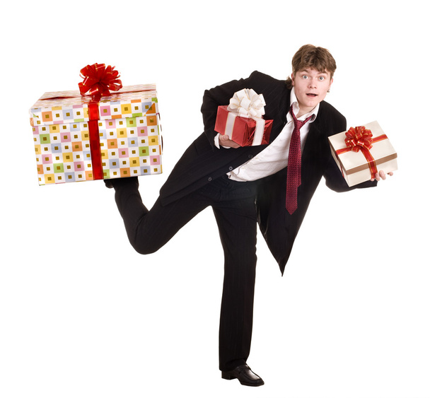 Man with falling gift box run. - Photo, Image