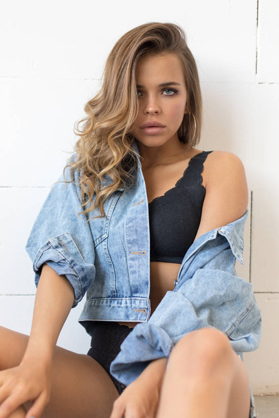 Sexy young woman in underwear and denim jacket. - Foto, Imagem