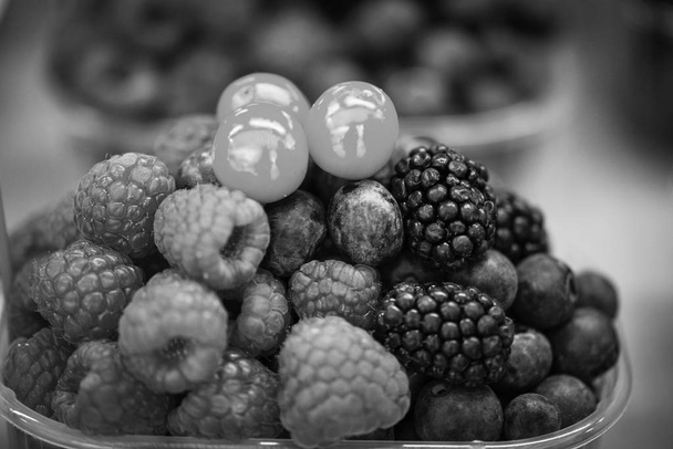 fresh berries close up - strawberries, blueberries, red berries, raspberry, black berries  - Photo, Image