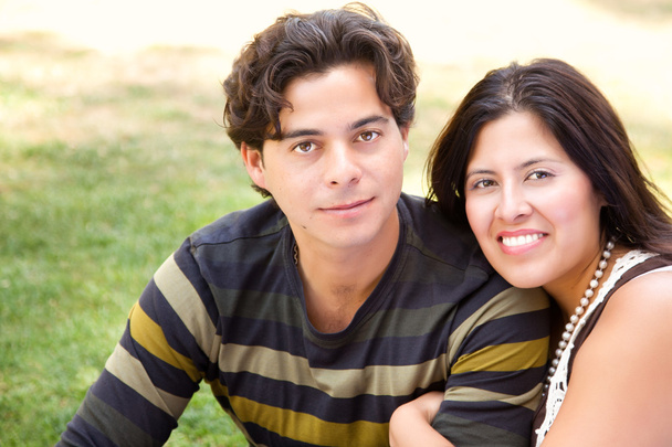 Attractive Hispanic Couple Portrait Enjoying Each Other Outdoors. - Photo, Image