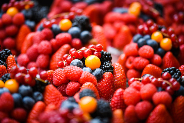 fresh berries close up - strawberries, blueberries, red berries, raspberry, black berries  - Фото, зображення