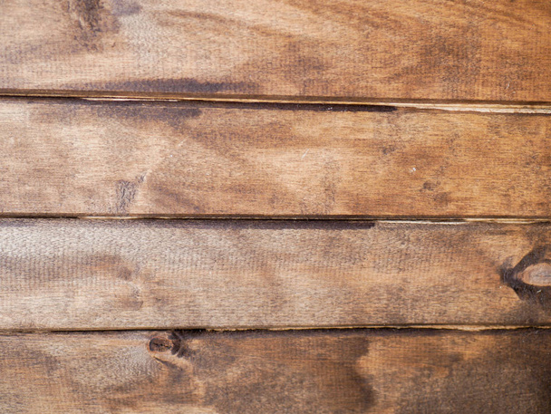 Cerrado muro horizontal de madera barnizada. Historia de la madera. Texto trasero. - Foto, imagen
