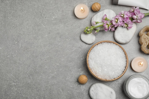 Flat lay composition with cosmetics on grey marble table, space  - Фото, зображення