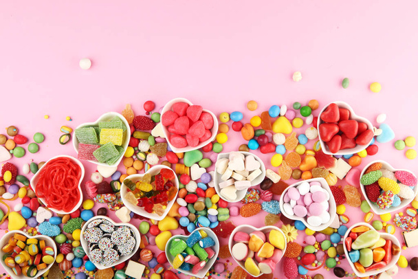 candies with jelly and sugar. colorful array of different childs - Photo, Image