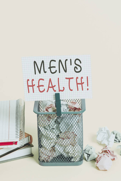 Conceptual hand writing showing Men S Health. Concept meaning state of complete physical mental and social well being by analysis Trash bin crumpled paper clothespin office supplies yellow - Photo, Image