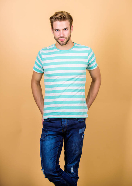 Confident and handsome. perfect look of muscular man. sexy macho in casual style. male fashion and beauty. summer fashion. Unshaven student guy. serious man in trendy shirt. Guy fashion model - Фото, изображение